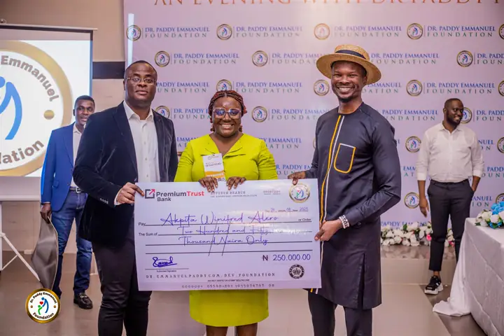 A grant presented on stage