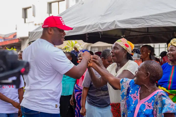 Greeting women at a Gift of Love event