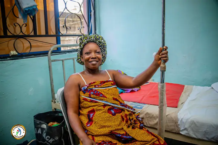 A patient recovering and smiling